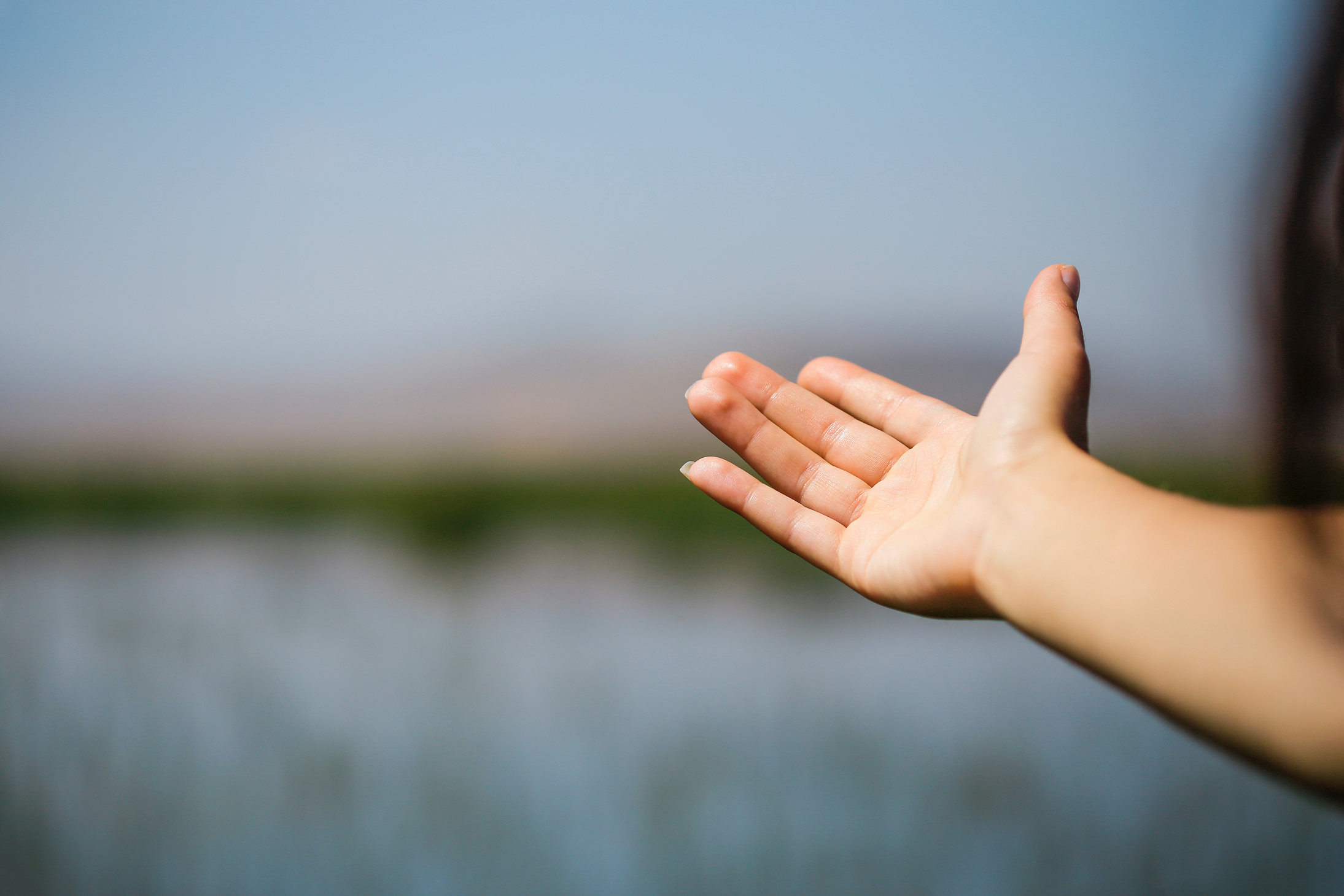 The woman point out to lake in Turkey