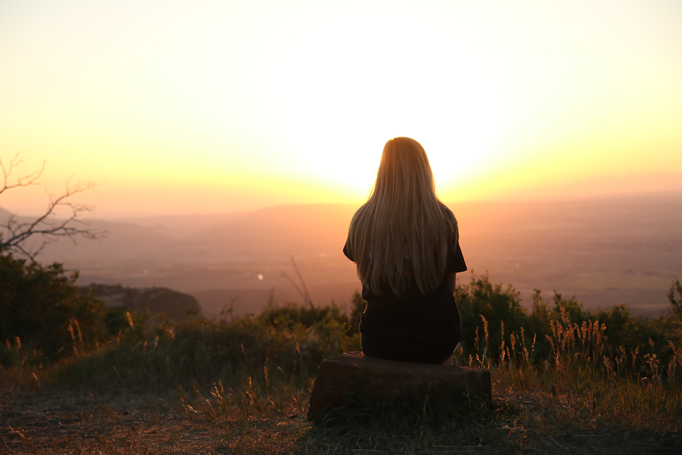 Girl Admiring the Sunset View